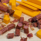 Sticks_on_Cuttingboard_BaconChedda